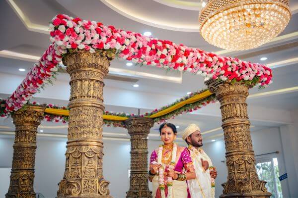 Karnataka style wedding stage celebration with couple in traditional attire, wedding photographer in Basavanagudi