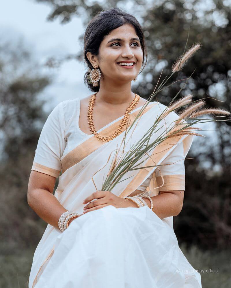 Kerala Onam saree portrait captured in natural light