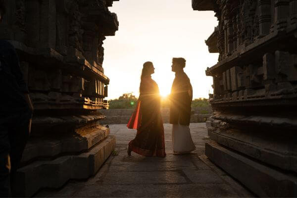 Temple pillars sunrise wedding couple photography in Basavanagudi